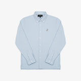 A light blue button-down shirt laid flat against a white background.