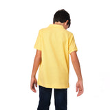 Rear view of the boy wearing the yellow polo shirt, showing the plain back design.