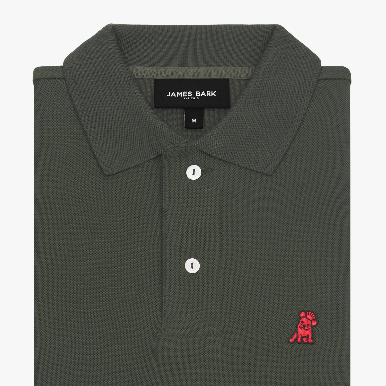 Folded olive green polo shirt showing collar, buttons, brand tag, and red embroidered dog logo