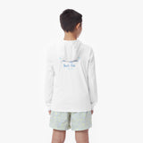 Back picture of a child wearing a white hooded rashguard with 'Beach Club' text and light-colored shorts on a white background