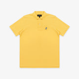 The yellow polo shirt laid flat, showing the entire front design.