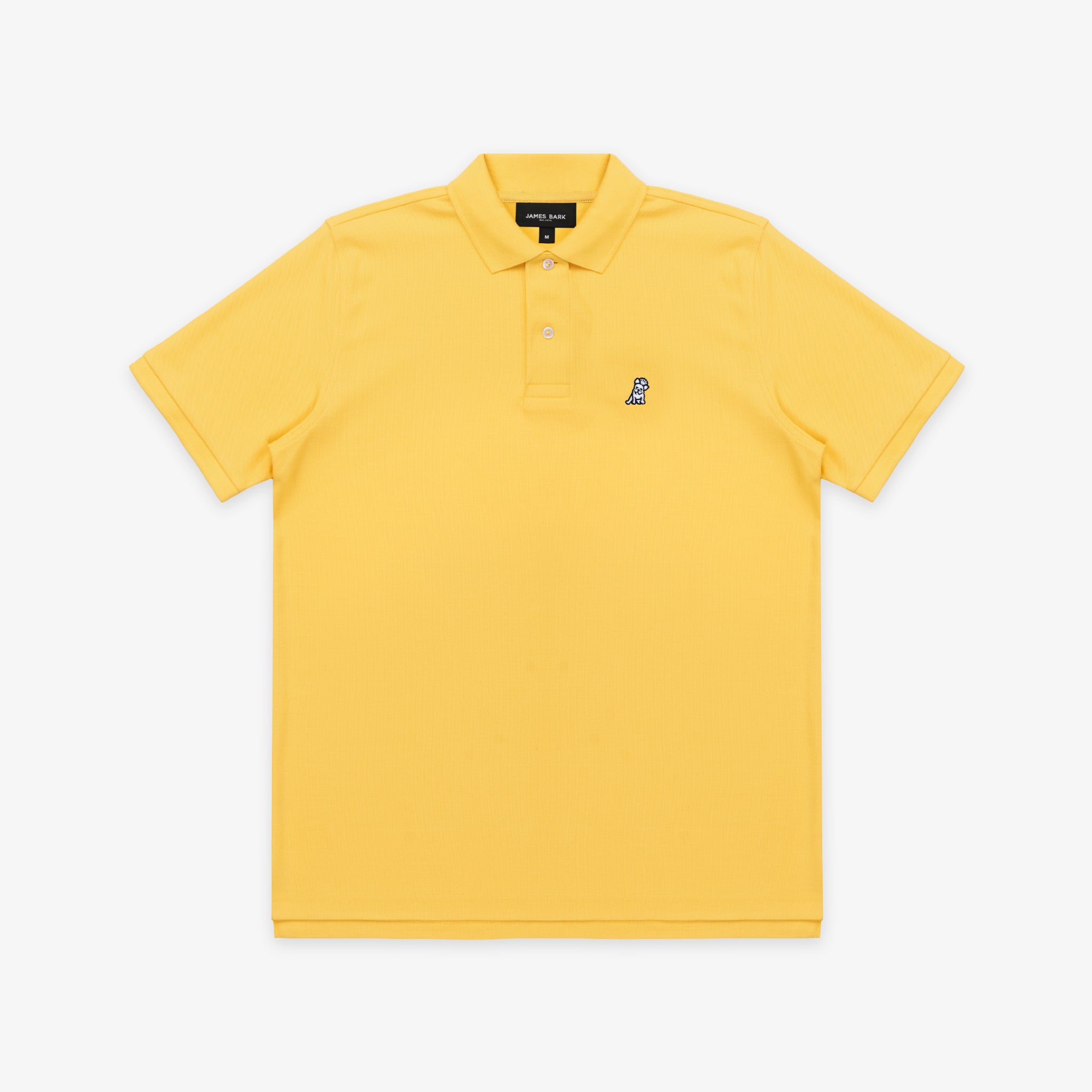 The yellow polo shirt laid flat, showing the entire front design.