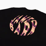 Close-up of the back of the t-shirt, focusing on the swirling "James Bark" graphic in pink and orange hues.
