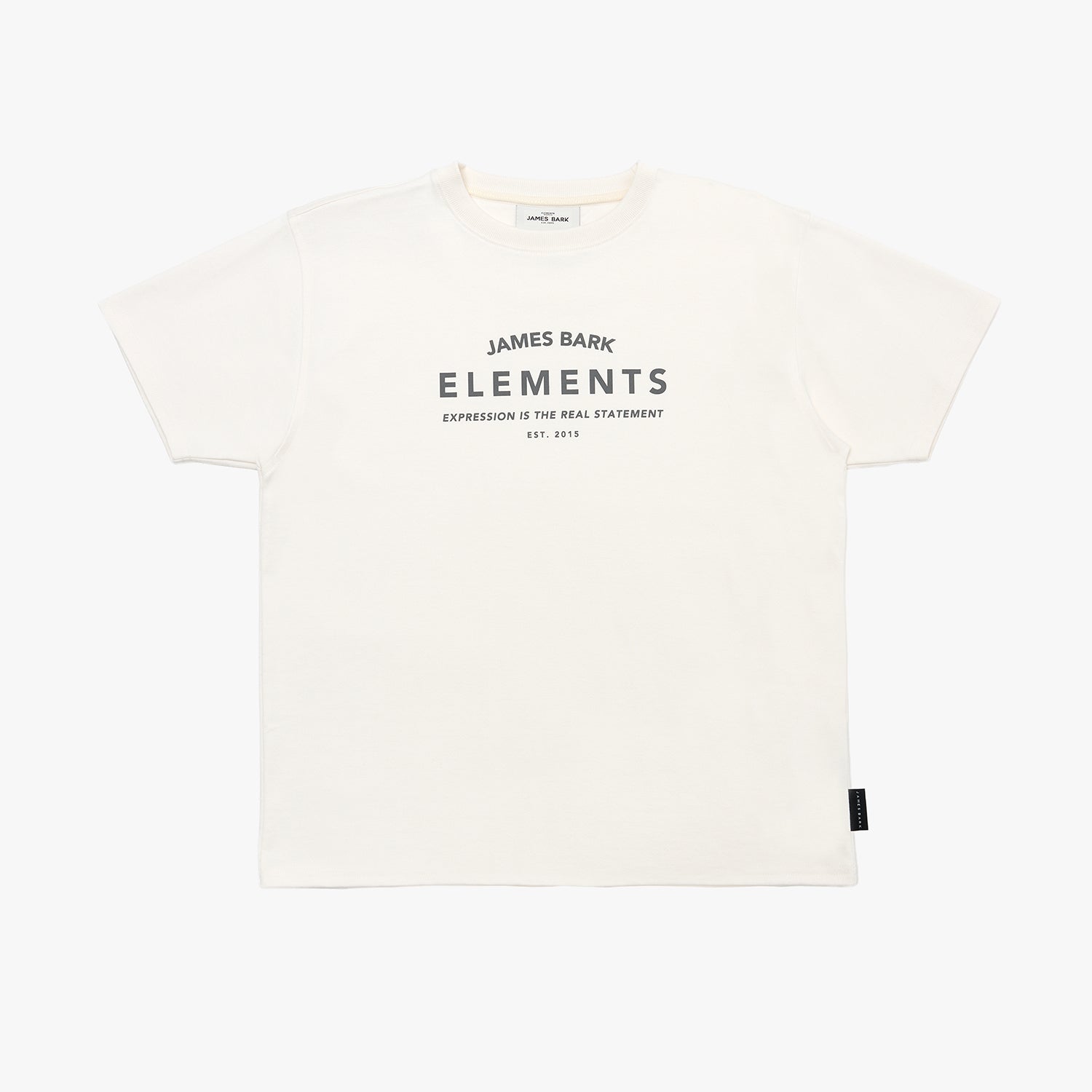 An off-white T-shirt with 'JAMES BARK ELEMENTS' printed in black on the chest, displayed flat