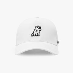 A white baseball cap featuring a black embroidered cartoon dog wearing a flower crown on the front