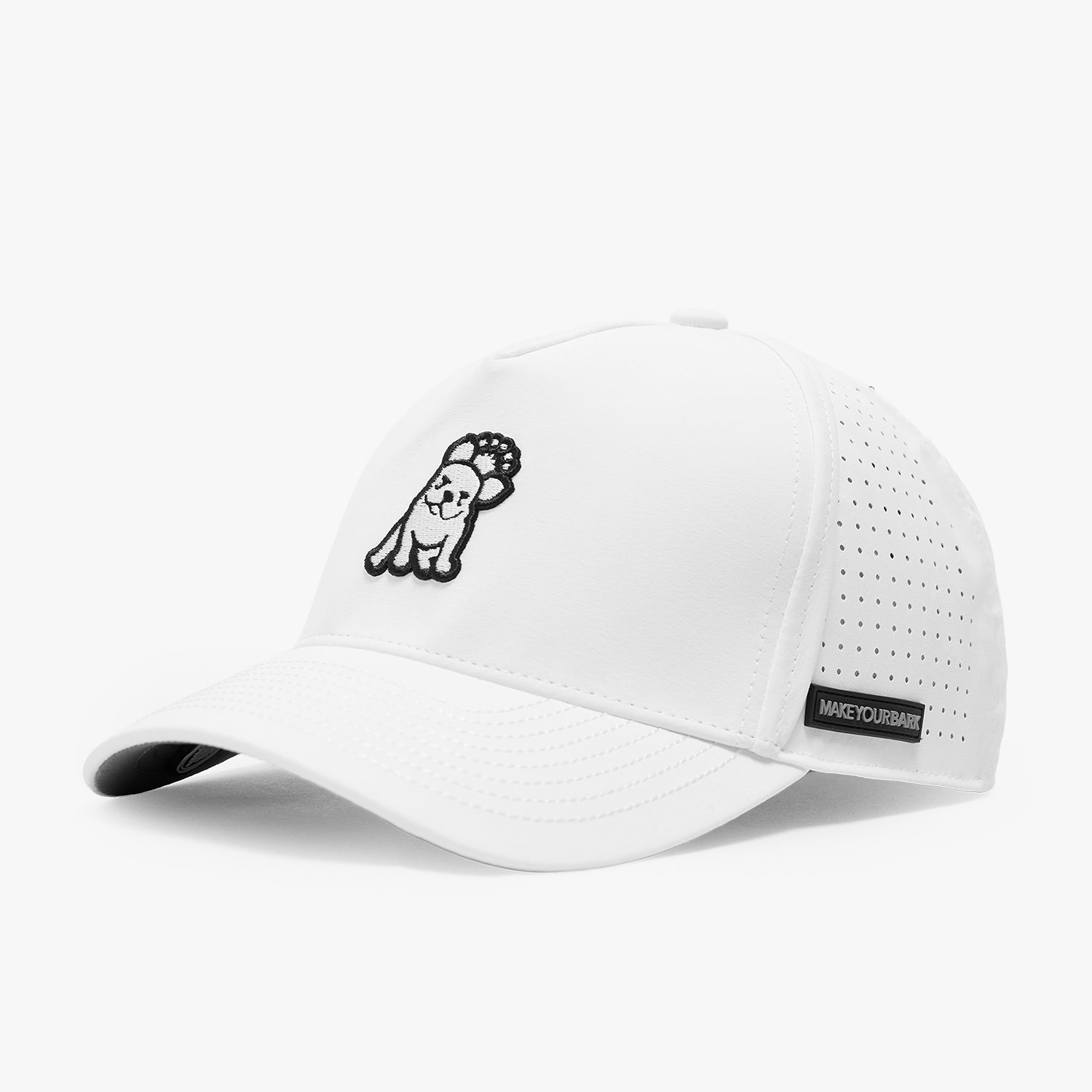 A white structured baseball cap with a curved brim, featuring a black embroidered cartoon dog graphic on the front