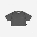 A dark gray short-sleeve crop top t-shirt with 'JAMES BARK ELEMENTS' printed in light gray on the left chest, displayed flat.