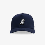 A navy blue baseball cap featuring a small embroidered dog patch on the front