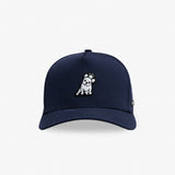 A navy blue baseball cap featuring a small embroidered dog patch on the front