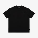A black T-shirt with a small dark gray 'JAMES BARK' logo on the left chest, displayed flat against a light gray background.