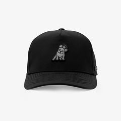 A black baseball cap with a tonal black embroidered cartoon bear on the front