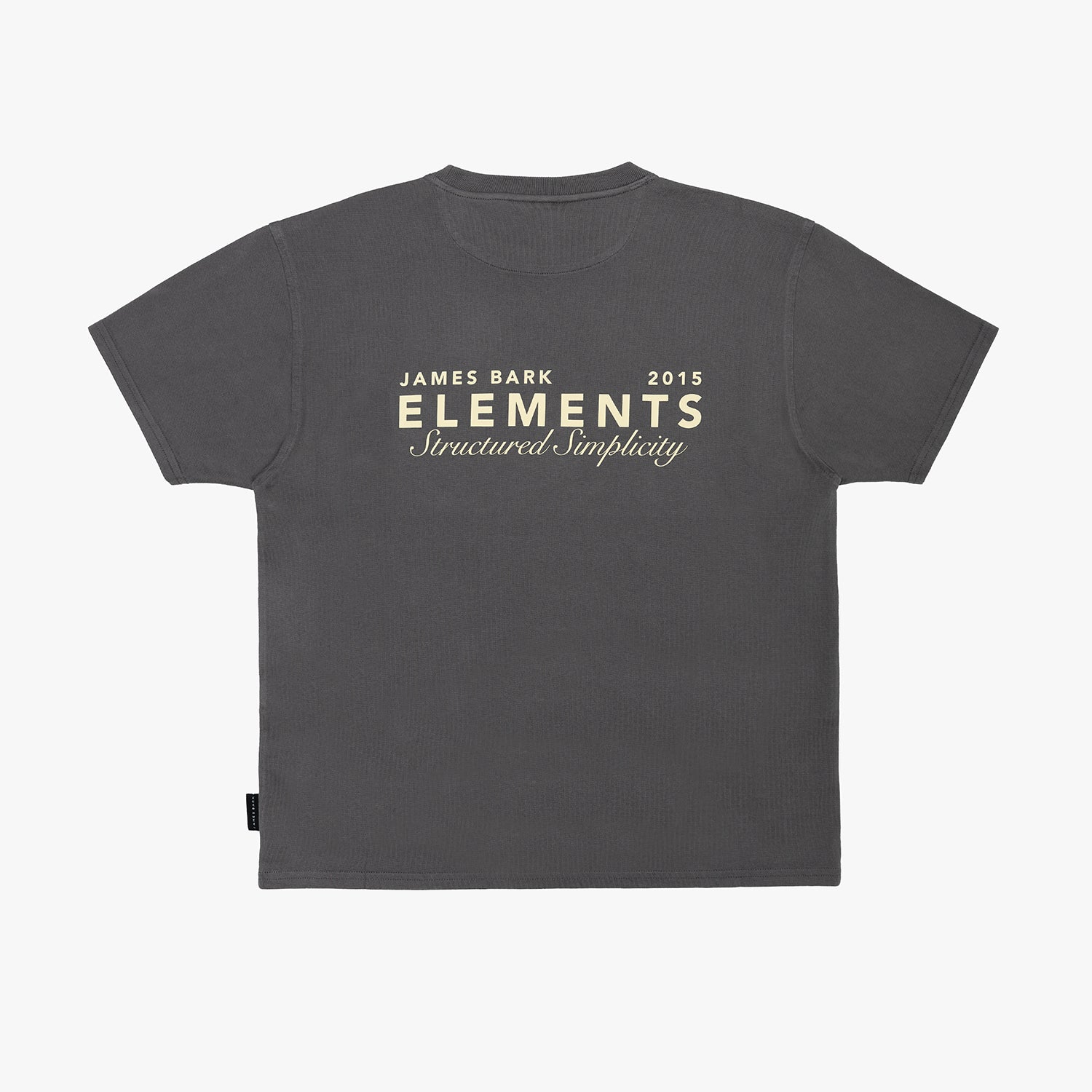 Back view of a dark gray T-shirt by James Bark Elements, featuring a big ELEMENTS Graphic logo