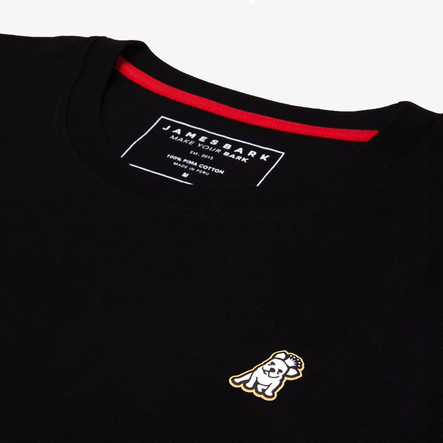 Flat-lay front view of the black t-shirt highlighting the small logo on the chest.