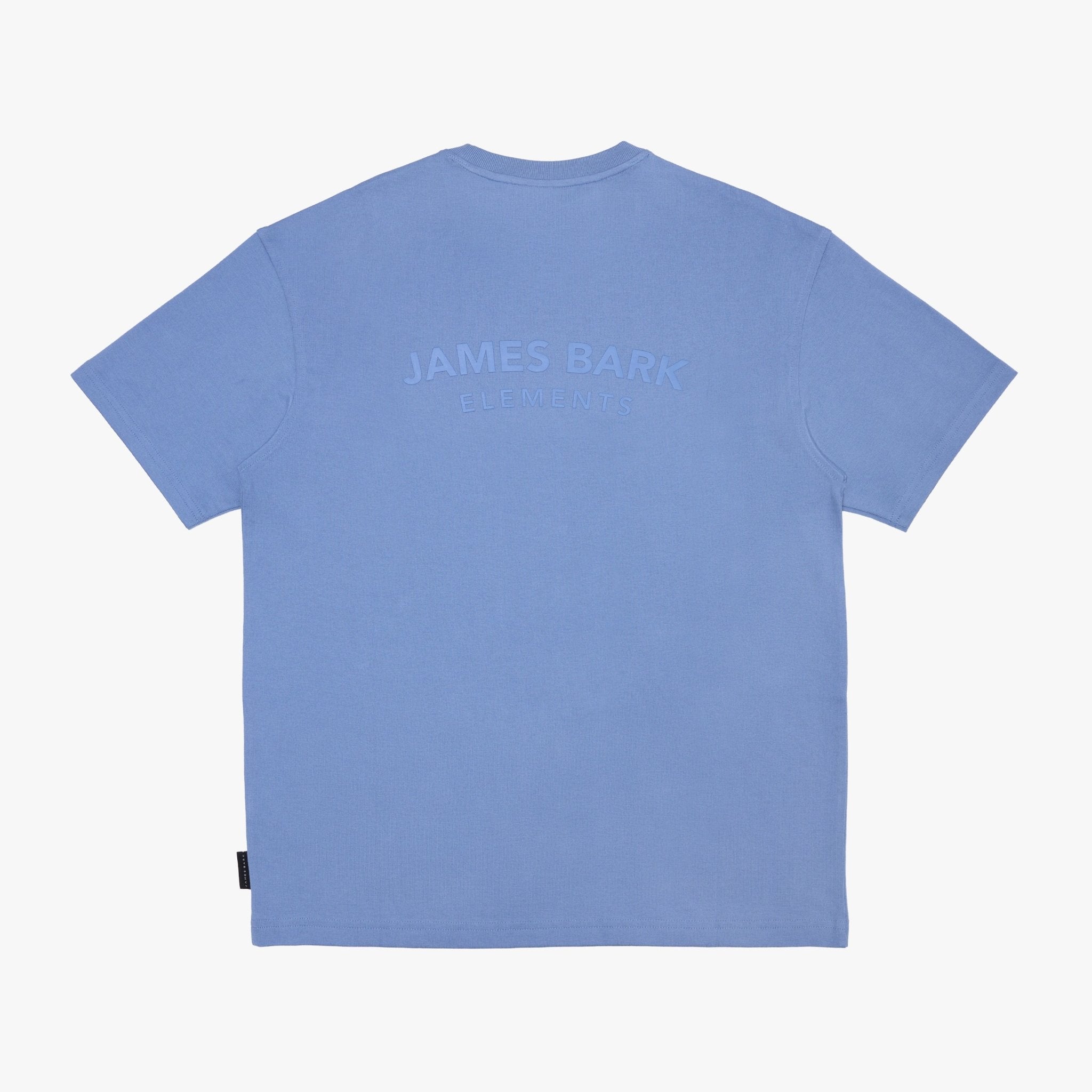 A light blue T-shirt shown from the back, featuring a tonal, slightly darker blue 'JAMES BARK ELEMENTS' logo printed across the upper back, displayed flat.