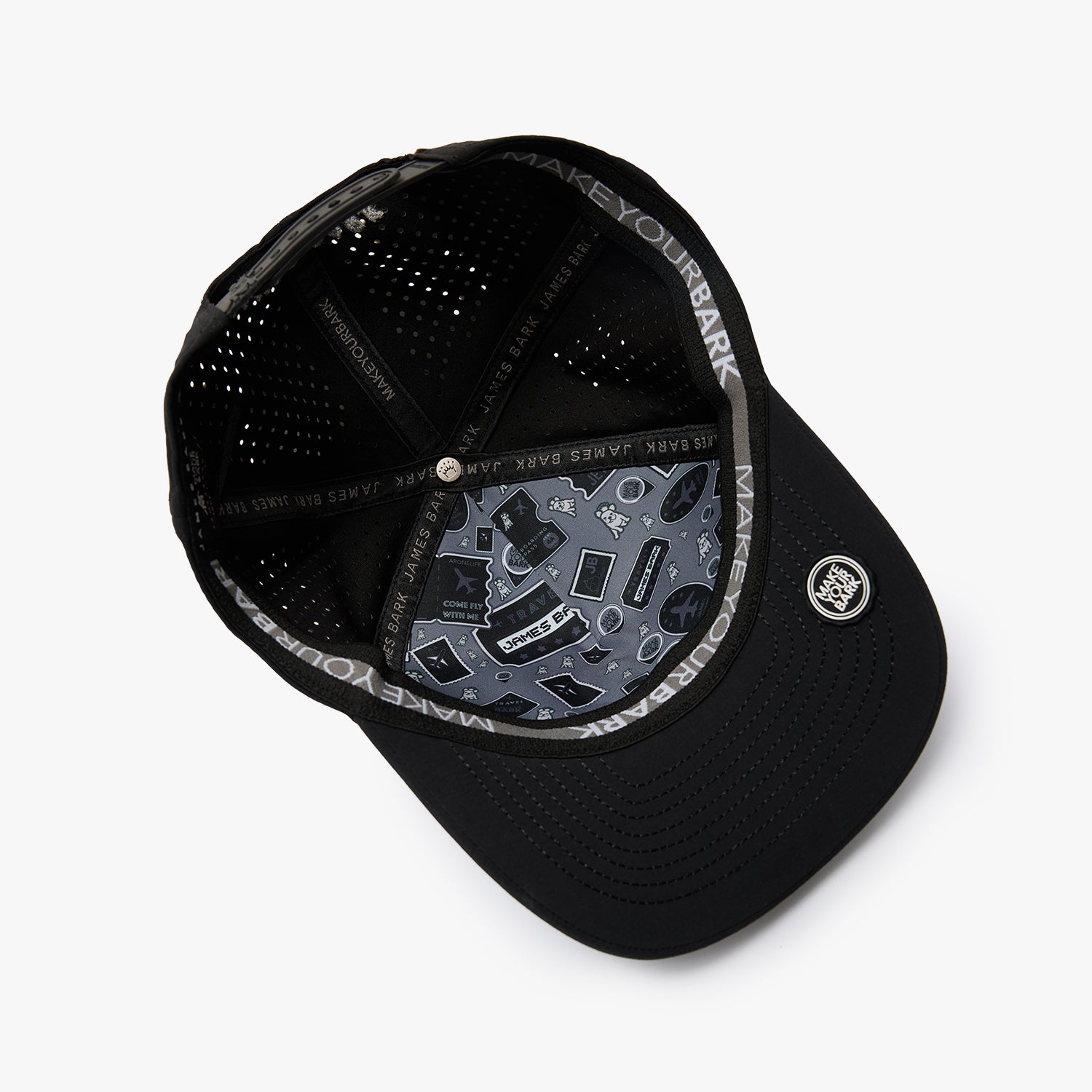 Black structured baseball cap with a curved brim, featuring a gray and black graphic pattern on the underside of the brim and a circular silver logo on the side