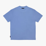 A light blue short-sleeve T-shirt lay flat against a clean, off-white background.