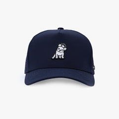 A navy blue baseball cap featuring a small embroidered cartoon dog wearing a star-spangled hat on the front