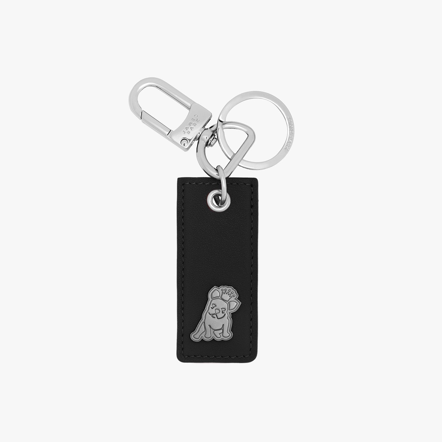 Stylish keychain featuring a rectangular black leather tag with a silver embossed dog logo at the bottom. The tag is paired with a polished silver keyring and a clasp hook, offering a modern and functional accessory.