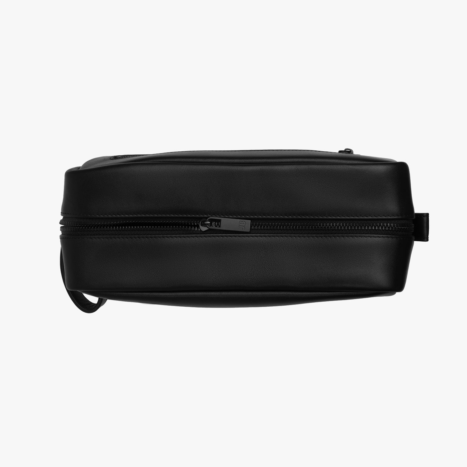 A top-down view of the toiletry bag, displaying its compact and streamlined design, perfect for travel or daily use.