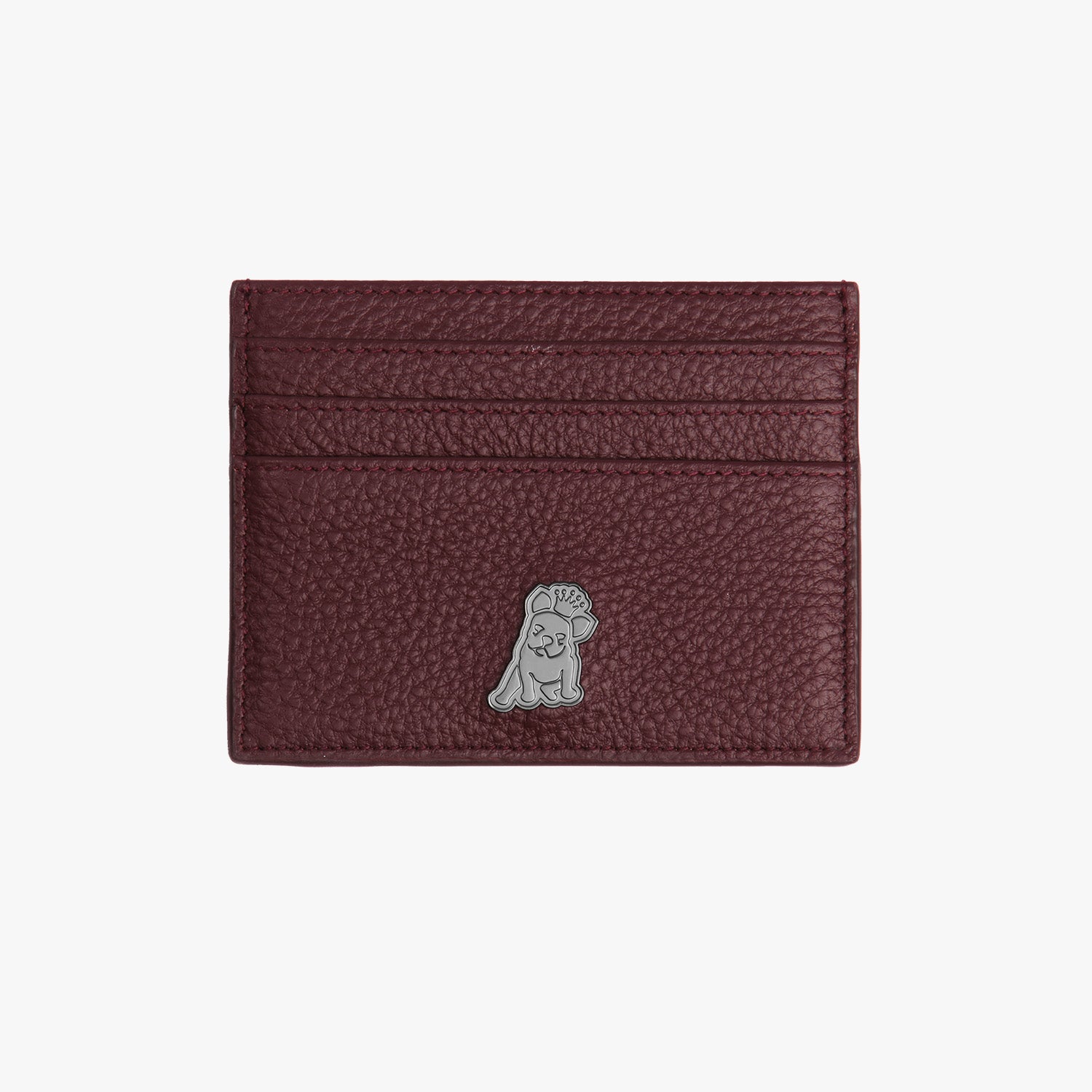 A front view of a deep red leather cardholder with a pebbled texture. The design features a small silver embossed dog logo at the bottom, along with multiple card slots for added utility.