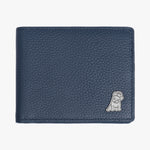 A close-up view of the front side of a navy blue leather wallet with a pebbled texture. The design features a silver embossed dog logo at the bottom corner, adding a touch of elegance to the minimalist style.