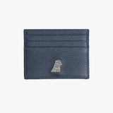 A front view of a navy leather cardholder with a pebbled texture. The design features a small silver embossed dog logo at the bottom, along with multiple card slots for added utility.