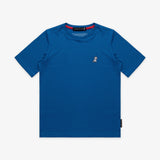 Flat-lay front view of the blue t-shirt showing the small white embroidered logo on the chest.