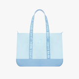 Light blue tote bag with 'James Bark' branding on a white background