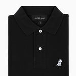 Close-up of the collar and upper part of the black polo shirt, showing the buttons and the small embroidered logo on the chest.