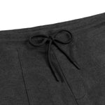 A close-up of the drawstring waistband, indicating the adjustable fit.