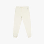 Flat-lay front view of cream-colored jogger pants with cuffed ankles and a drawstring waistband