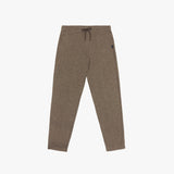 A side view of the brown casual pants showing their tapered fit and minimal design.