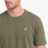 Close-up of a Man wearing a green t-shirt on a white background