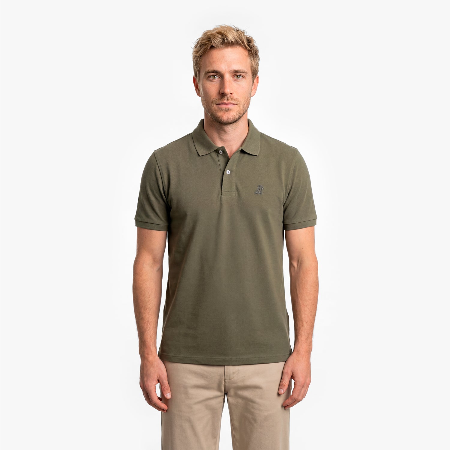 Man wearing a green polo shirt on a white background