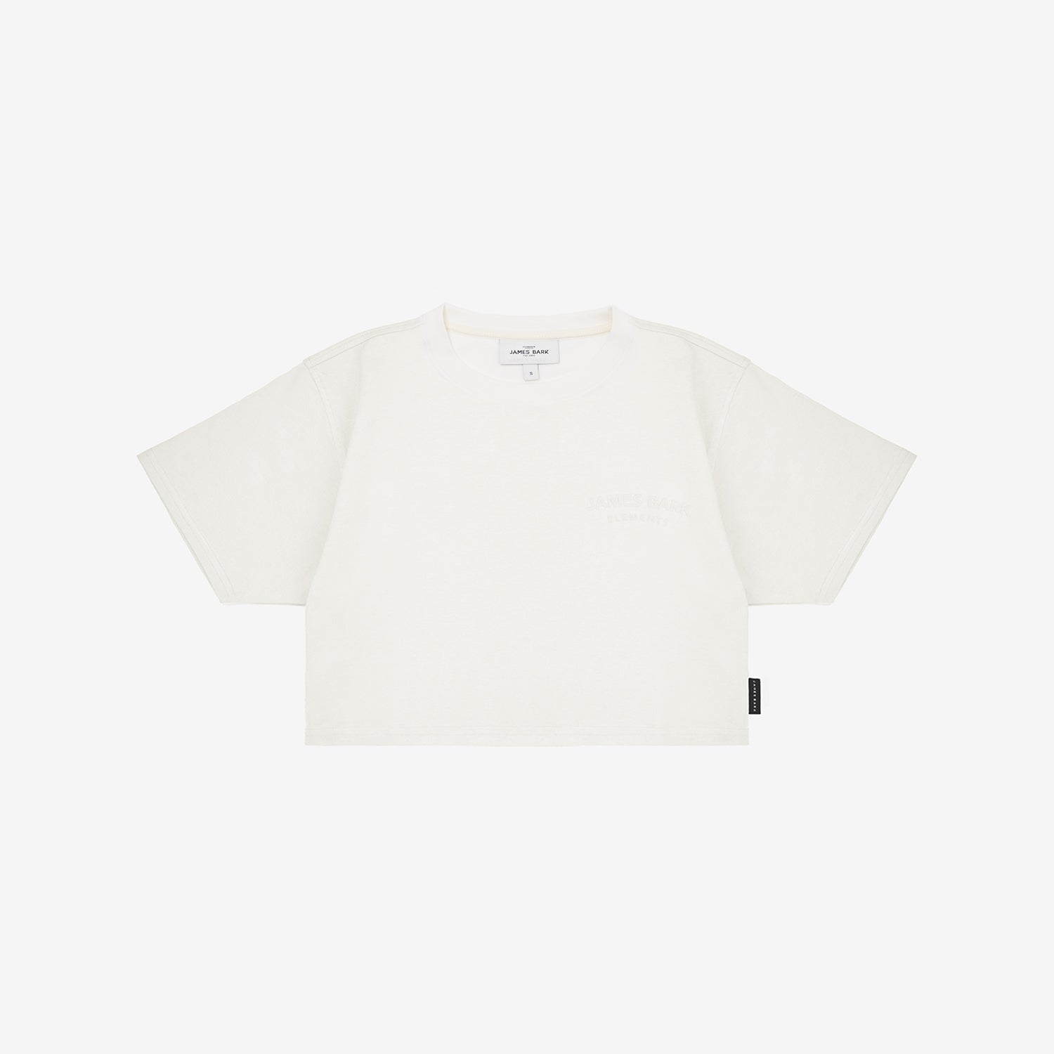 A white crop top t-shirt with a small tonal logo on the left chest and a small black brand tag on the lower hem
