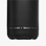 Close-up view of the bottom part of the black water bottle, featuring the text 'MAKE YOUR MARK' printed in white.