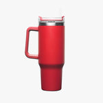 Side view of the red insulated travel mug with a handle, showcasing its sleek and ergonomic design.