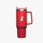 A vibrant red insulated travel mug with a sturdy handle, a silver dog logo printed on the front, and a stainless steel rim with a clear lid featuring a built-in straw.