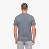 Back view of a man wearing a gray t-shirt on a white background