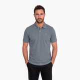 Men wearing a gray polo on a white background