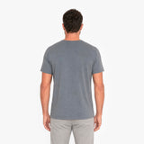 Man wearing a gray t-shirt on a white background