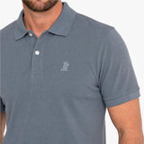 Close-up of a gray polo on a white background