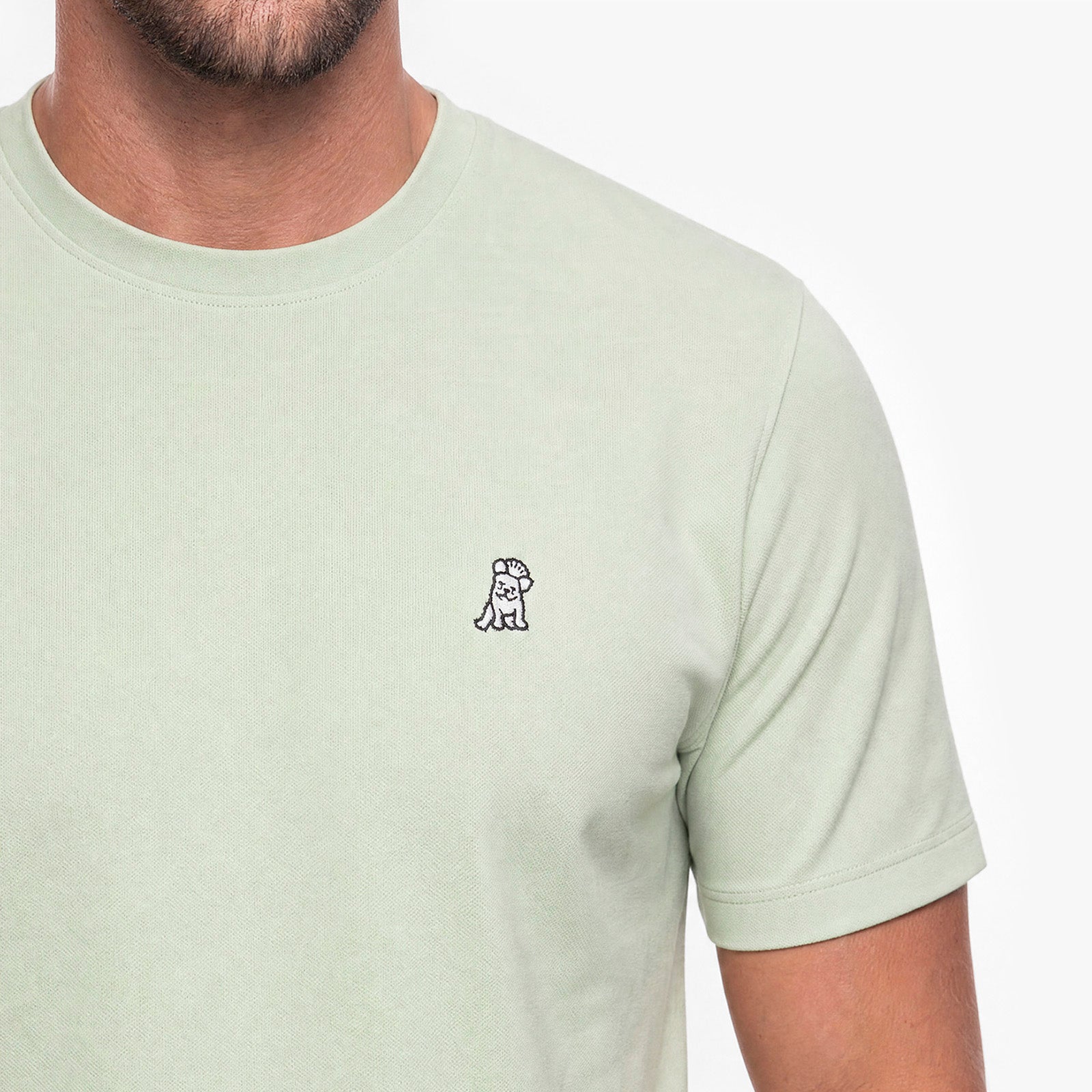 Close-up of a Men's Pique T-Shirt in color Fog Green