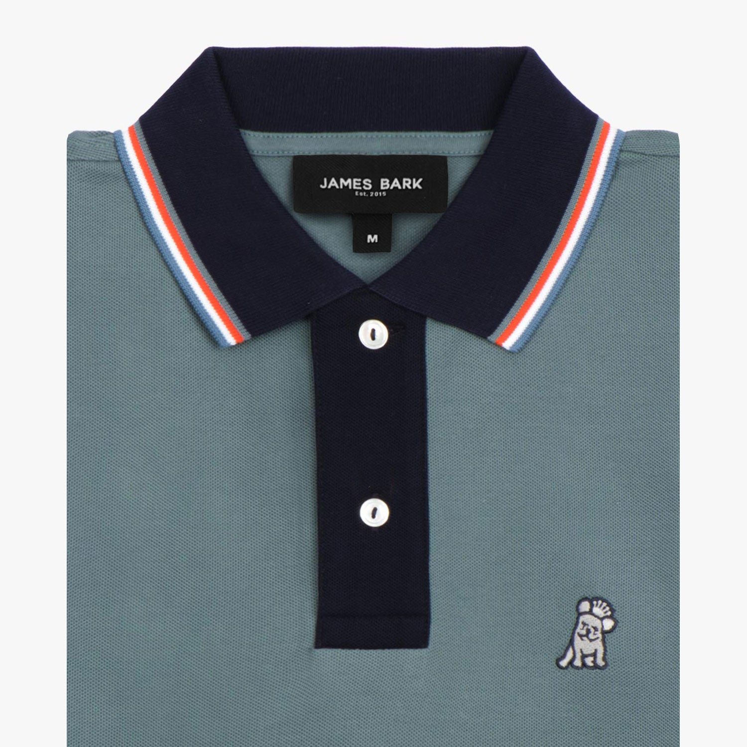 Close-up of the collar and upper part of the teal polo shirt, showing the buttons and the embroidered logo on the chest.