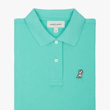 Flat-lay front view of the light turquoise polo shirt displaying the buttoned collar and embroidered logo.