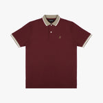 Flat-lay of the maroon polo shirt: The shirt is laid flat, showcasing the front design with a beige collar, sleeve cuffs, and button placket, along with the small embroidered logo on the chest.