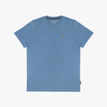 The blue t-shirt laid flat, showing the front of the shirt with the small embroidered animal logo on the left chest.