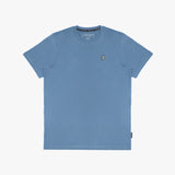 The blue t-shirt laid flat, showing the front of the shirt with the small embroidered animal logo on the left chest.