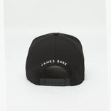 Rear view of the black cap displaying "JAMES BARK" text embroidered in white