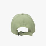 Back view of a green cap with 'James Bark' branding on a white background